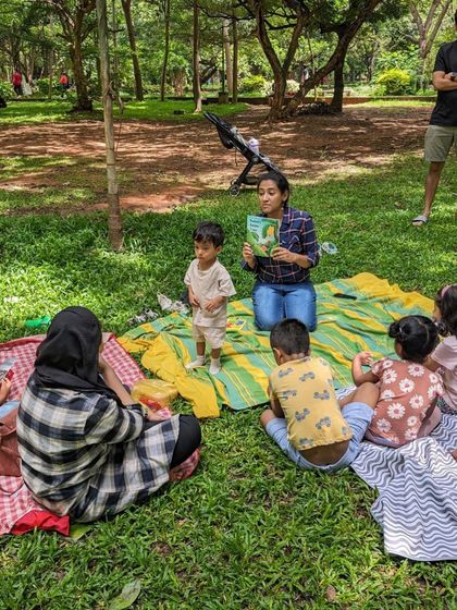 More scenes from our reading of 'Bumoni's Banana Trees', with children of all ages participating and listening.
