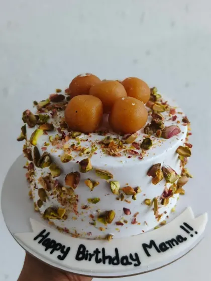 For those who love a desi twist, I present my Gulab Jamun cake. It's a delicious fusion cake with soft, syrupy gulab jamuns nestled on top and garnished with pistachios. It’s a crowd-pleaser at any family gathering or celebration.
