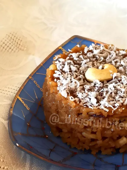 A side view of my Gur Wale Chawal, showing the rich texture of the jaggery sweetened rice. This is a truly comforting and traditional dessert.