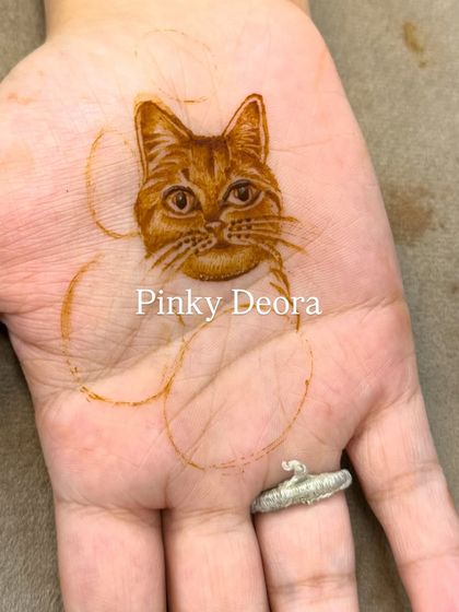 The initial sketch of the cat portrait. This shows how I start with a light outline to get the proportions right before filling in the details.