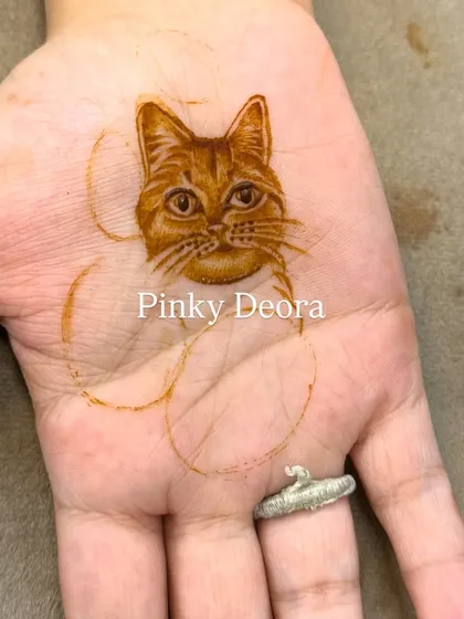 The initial sketch of the cat portrait. This shows how I start with a light outline to get the proportions right before filling in the details.