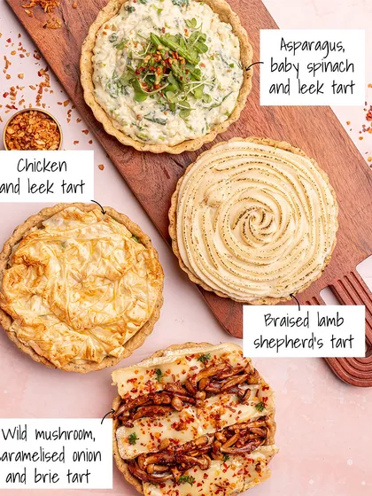 Our savory tarts are pure comfort, made with the flakiest crusts and richest fillings. Here you can see the variety we offer, including the Wild Mushroom with caramelized onion and brie, a creamy Asparagus, baby spinach and leek tart, and a hearty Braised Lamb Shepherd's tart.