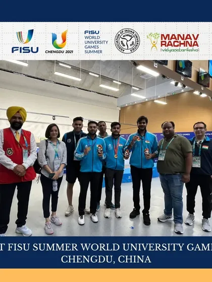 Our officials with the medal-winning shooters at the World University Games. Our team provided management, coaching, and sports science support, leading to 14 medals.