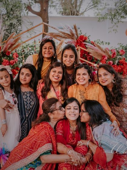 A beautiful group photo of the bride surrounded by the women in her family. These moments of love and support are at the heart of any wedding.