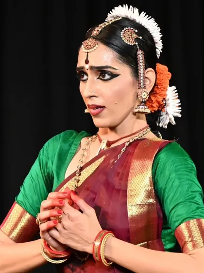 The intensity of expression on Madhura's face as she performs an abhinaya piece. This is the result of years of training in emotional storytelling.