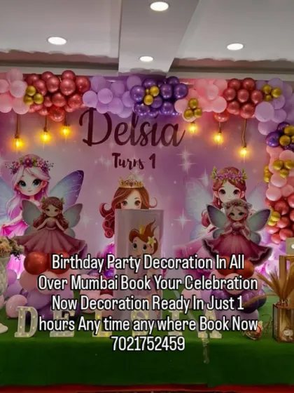 A whimsical fairy-themed birthday party for a first birthday. This large-scale decoration features a magical forest backdrop, beautiful fairy cutouts, and a colorful balloon arch.