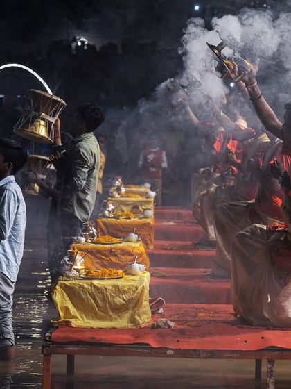 The Ganga Aarti continues even as the river swells during the monsoon. This image shows the adaptability and resilience of faith in Varanasi.