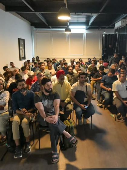 A wide shot of the audience during one of my photography workshops. It's always inspiring to see so many people eager to learn and improve their craft. The questions and interactions are a valuable part of the learning process for everyone.