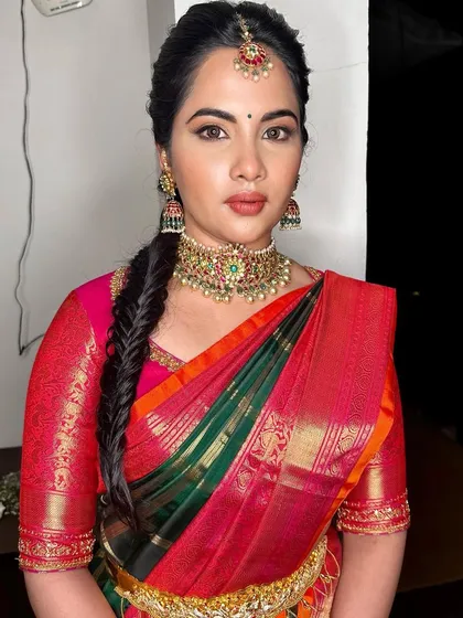 A portrait showing the balance of the makeup. The eyes are defined but not heavy, and the skin has a beautiful, healthy radiance.