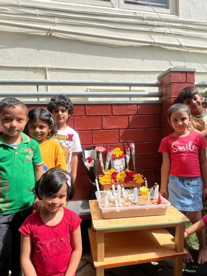 Our children celebrating the birthday of Dr. Maria Montessori. By lighting candles and sharing flowers, they pay tribute to the visionary who discovered this wonderful path of learning, exploration, and self-discovery.