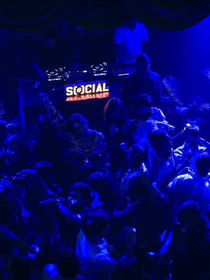 The dance floor at Sarjapur Social under the signature blue lights. It's an iconic view that always signals a great party.