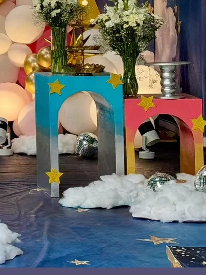 The starry night themed flooring and cloud decorations create a fully immersive experience.