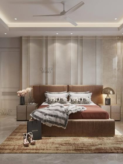 Elegance meets comfort in this beautifully designed bedroom. The space features a warm, neutral color palette, a comfortable bed with a plush throw, and a dedicated vanity area for getting ready in style.
