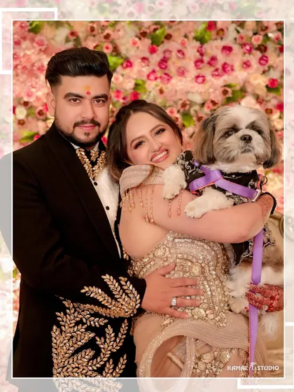 A happy family portrait, including the couple's beloved dog, showcasing the warmth and love of their engagement day.