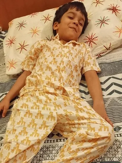 This little one looks so cozy and ready for bed in our yellow Giraffe print pyjama set. It’s one of our most requested animal prints for kids.