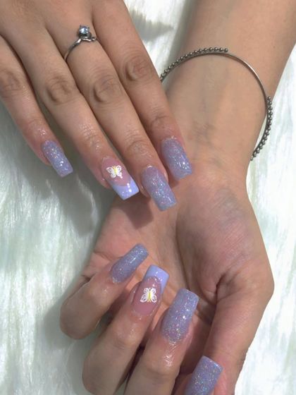 A full view of the whimsical lavender glitter and butterfly set.