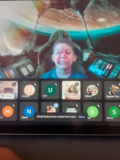 Having fun while learning. A student uses a creative virtual background during one of our online sessions. We encourage kids to be themselves and enjoy the process.