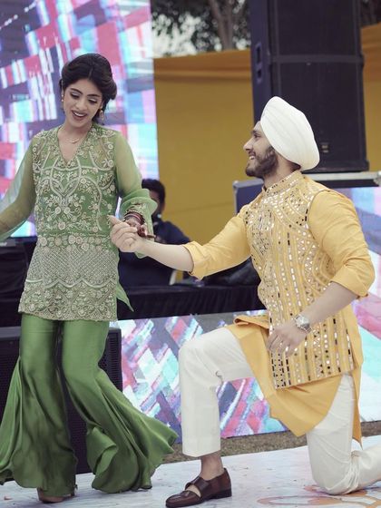 A classic romantic pose that never fails to make the crowd cheer. This couple nailed their performance.