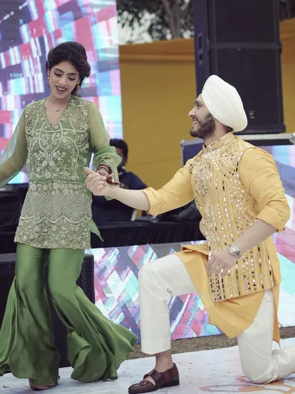 A classic romantic pose that never fails to make the crowd cheer. This couple nailed their performance.