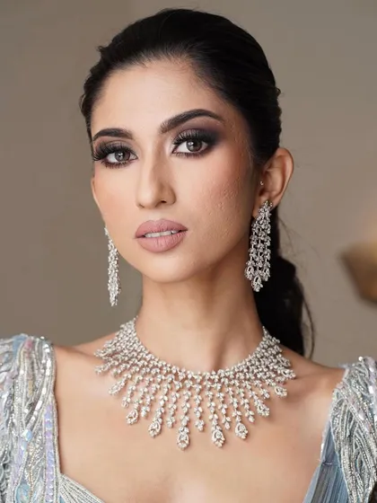 Another close-up of the reception look, focusing on the flawless skin and the beautifully blended smokey eye.