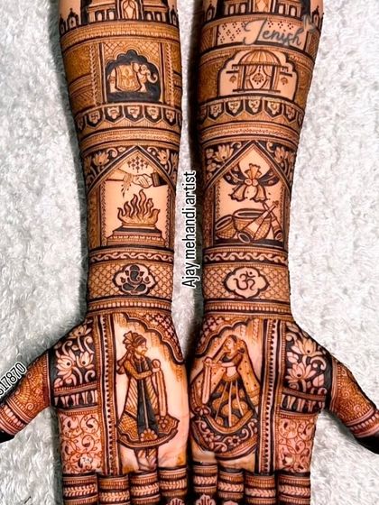 A full view of the design with couple portraits and sacred symbols. The detail work is consistent from the fingers to the forearms.