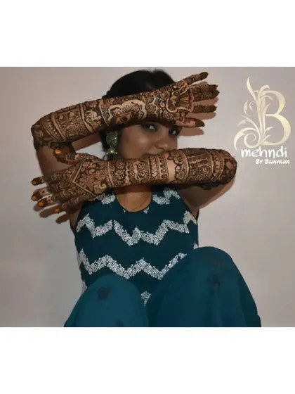 Another view of the client's full arm mehndi.