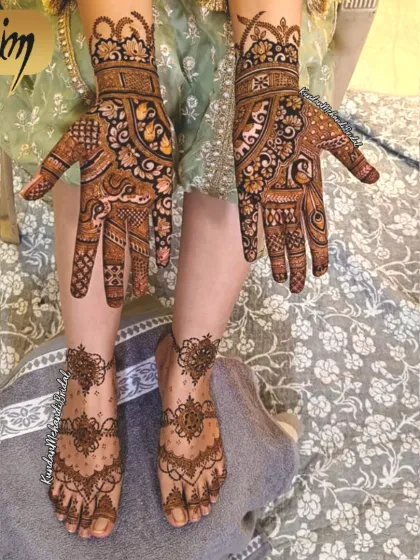 A complete bridal look with matching intricate designs on both hands and feet, for a cohesive and stunning appearance.