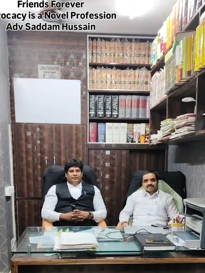 In my office with a colleague. Advocacy is a noble profession, and I am proud to work alongside other dedicated legal professionals.