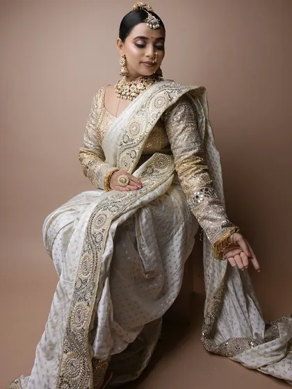 A full-length view of the student's creation, a graceful and classic Maharashtrian bridal look. Portfolio-worthy shots like this are part of the learning process.
