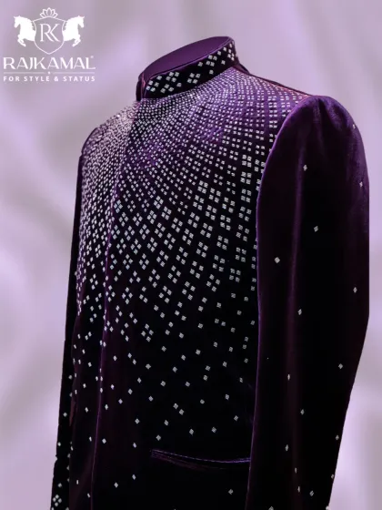 A side profile of the purple velvet Jodhpuri, highlighting the shimmer of the embellishments and the luxurious texture of the fabric.