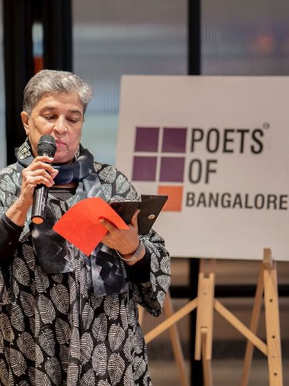 A poet reads her work at the "Break the Boundaries" event. The evening was a powerful reminder of the importance of women's voices.