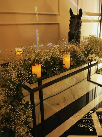 Another view of the horse-head console, showing how it was placed against the venue's striking black and white marble floor.