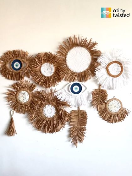 Creating a gallery wall of good vibes. This arrangement shows how you can mix and match different sizes and styles of my raffia and macramé hangings, including the protective evil eye.