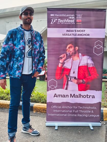 Posing next to my official banner at IIT Bombay's Techfest. It was an honor to be named the official anchor for multiple high-profile events.