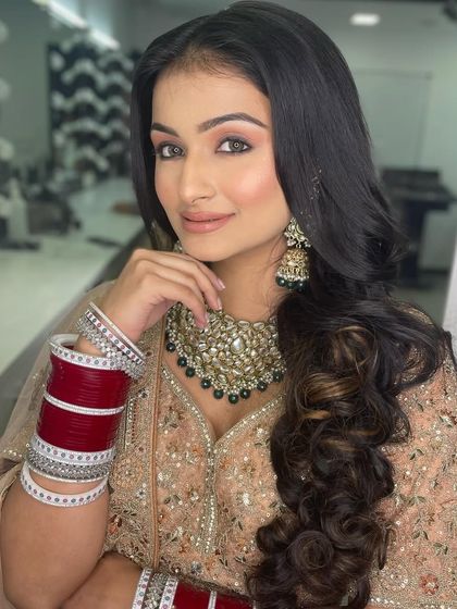 The addition of the chooda completes this look. Understanding the entire bridal ensemble is part of becoming a true bridal expert.