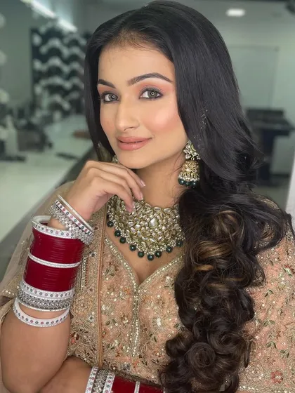 The addition of the chooda completes this look. Understanding the entire bridal ensemble is part of becoming a true bridal expert.