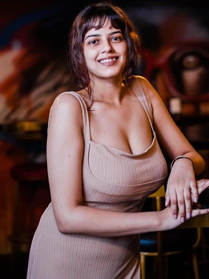 A guest posing at the bar.