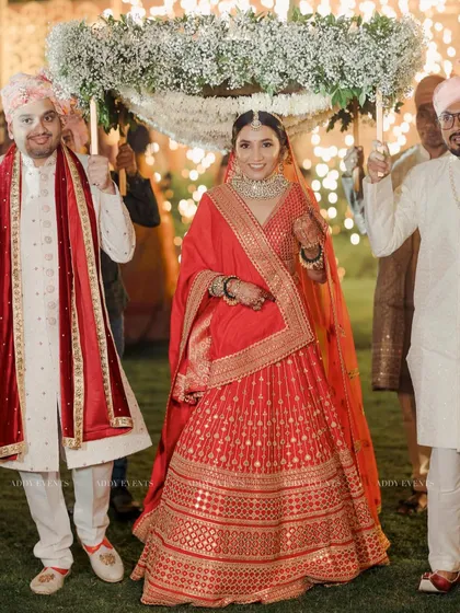 Every bride deserves a royal entrance. We design beautiful floral chaadars, like this one made of fresh baby's breath, to make the walk to the mandap a heavenly experience.