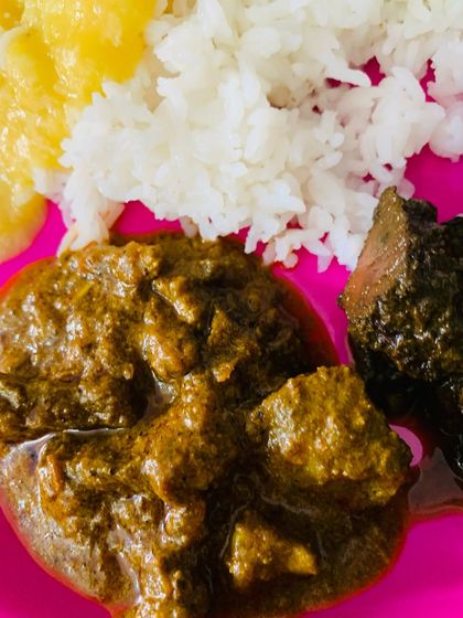 A close-up of the rich beef liver curry and the dark smoked pork with Aneshi. These are the kind of deep flavours I grew up with.