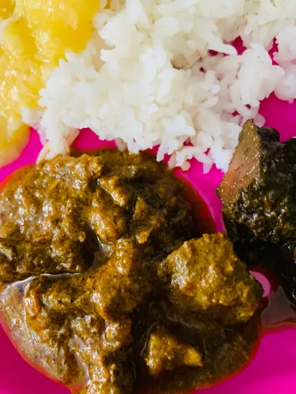 A close-up of the rich beef liver curry and the dark smoked pork with Aneshi. These are the kind of deep flavours I grew up with.