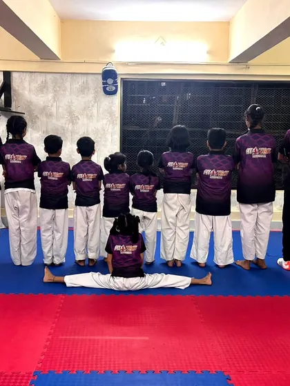 Our team, united and strong. This picture captures the spirit of our academy, where everyone supports each other.
