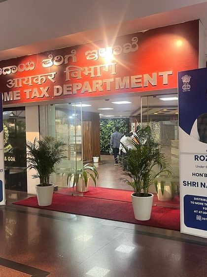 The entrance to the Income Tax Department, branded for the Rozgar Mela. We handle venue dressing and branding to create a cohesive and official atmosphere for government events.