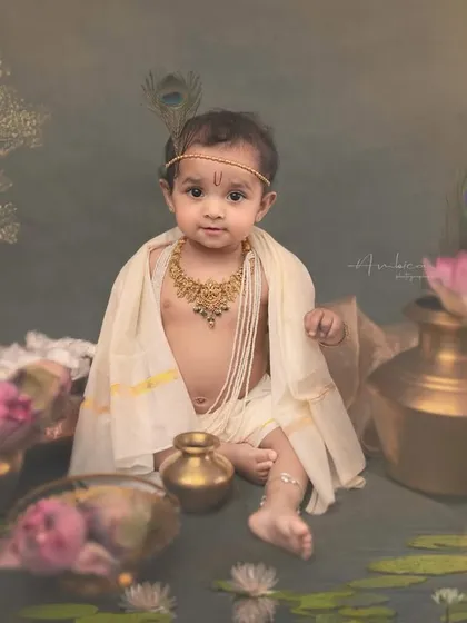A direct and engaging portrait. The baby looks right at the camera, inviting the viewer into the beautiful, mythological world we've built for him.