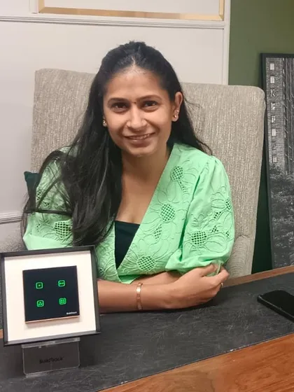 Principal architect Aashna Puri with our smart keypad. We are proud to partner with designers who create spaces that are both beautiful and intelligent.