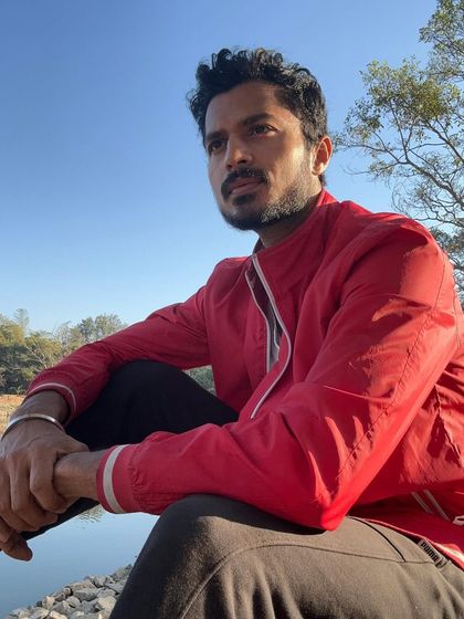 A profile shot against a clear blue sky, capturing a sense of peace and freedom.