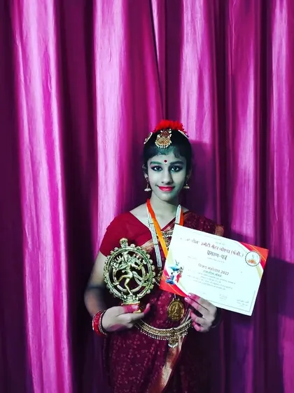 This young dancer from my Gurukul proudly displays her award. It fills my heart with joy to see my students recognized for their talent and hard work at various competitions and festivals.