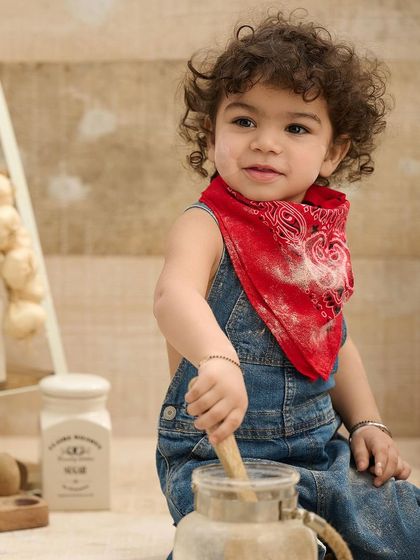 This little chef is getting serious about baking. We love capturing their focused expressions as they play with our food-themed props.