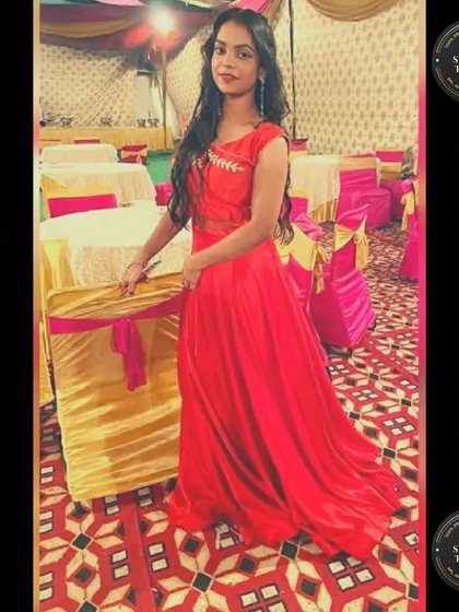 This vibrant red party gown was custom-made for a client. We can create modern, elegant gowns for any occasion, ensuring a fit that flatters your body type perfectly.