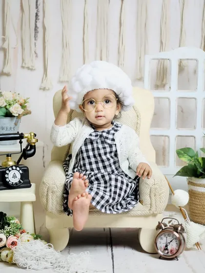 This little old lady is kicking up her feet and relaxing. I love working with parents to come up with unique and creative themes like this one.