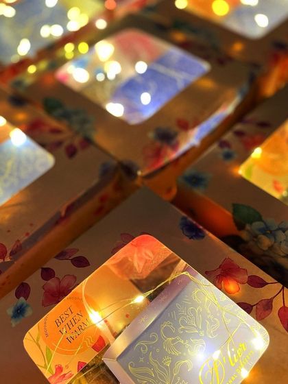 Our floral gift boxes glowing with fairy lights, capturing the sparkling and magical essence of the Diwali season.
